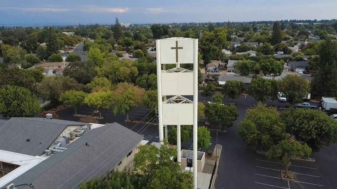 Aerial view of the church cross tower and campus