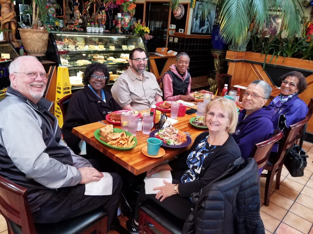 Seniors enjoying lunch fellowship together at a local restaurant
