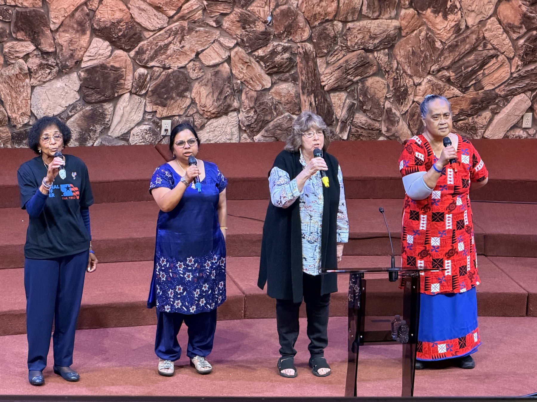 Worship band leading music on stage